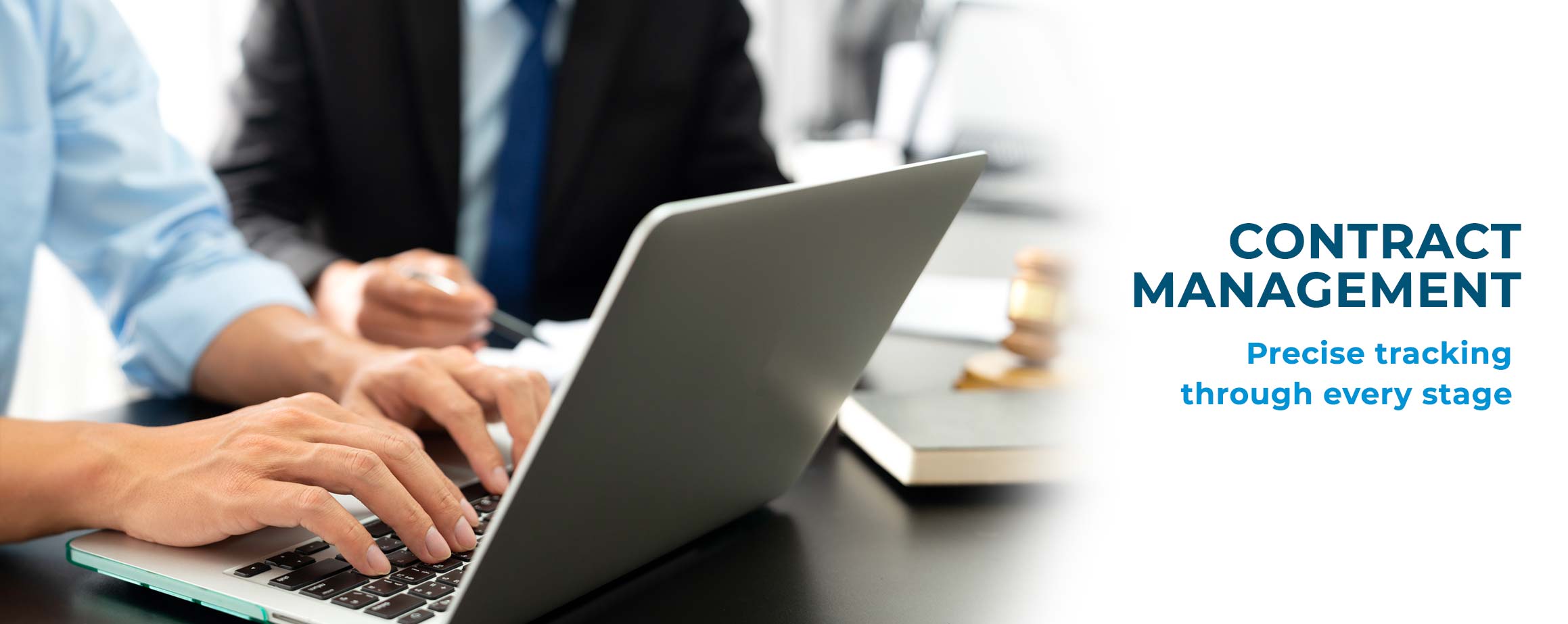 Two men working on laptop